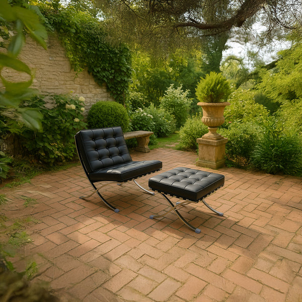 Fauteuil Lounge & Repose-Pieds – Cuir Véritable Noir et Structure Chromée Sculpturale