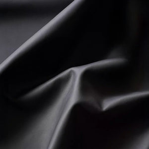 Fauteuil Lounge & Repose-Pieds – Cuir Véritable Noir et Structure Chromée Sculpturale